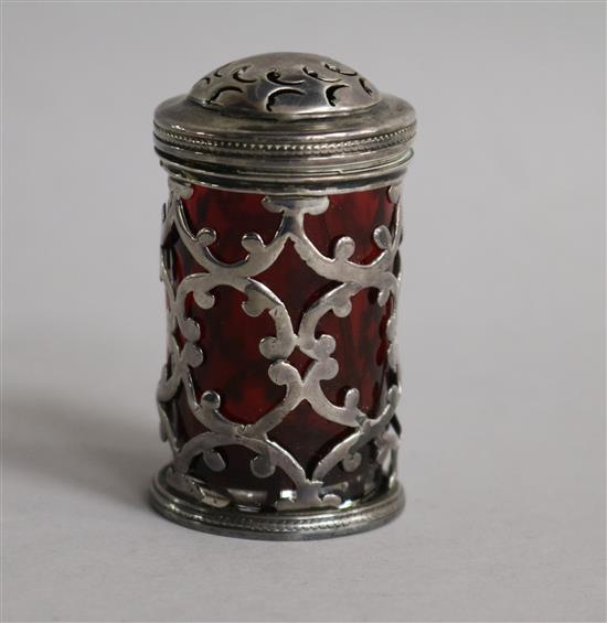 A Victorian silver pepperette, by Charles Thomas & George Fox, London, 1846, with red glass liner 64mm.